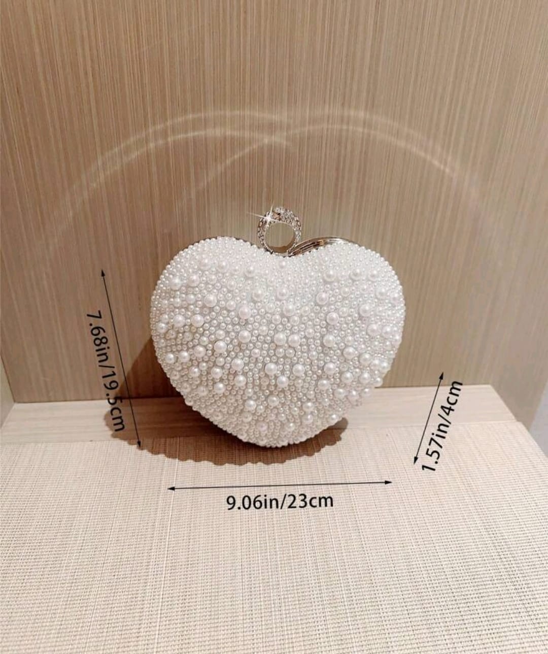 PEARL HEART CLUTCH BAG