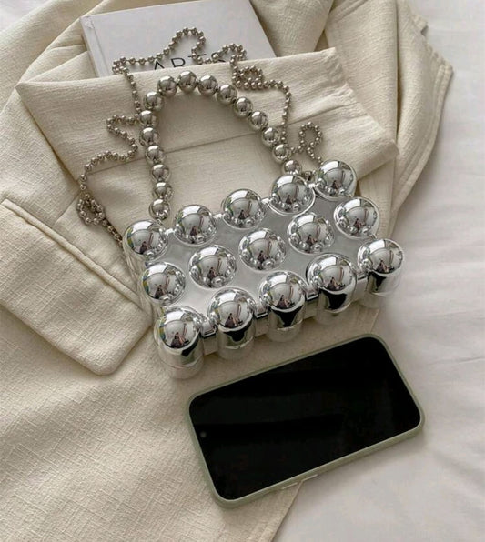 BEADED METAL LOOK DESIGN CLUTCH