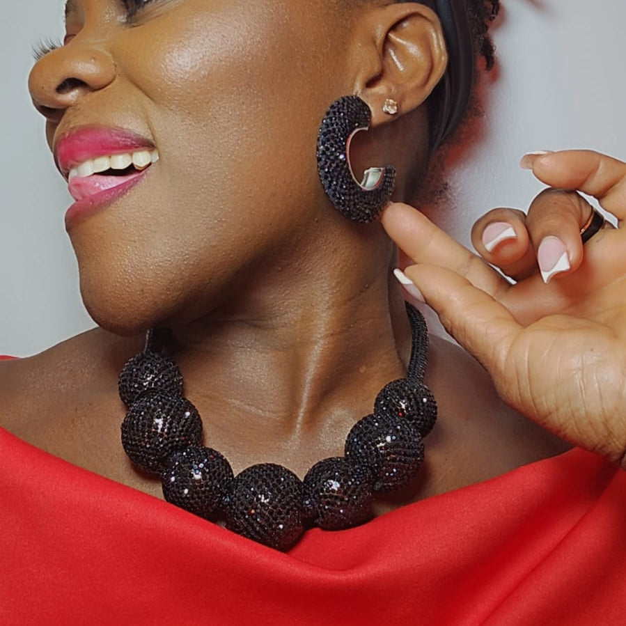 RHINESTONE BALL DESIGN EARRING SET.