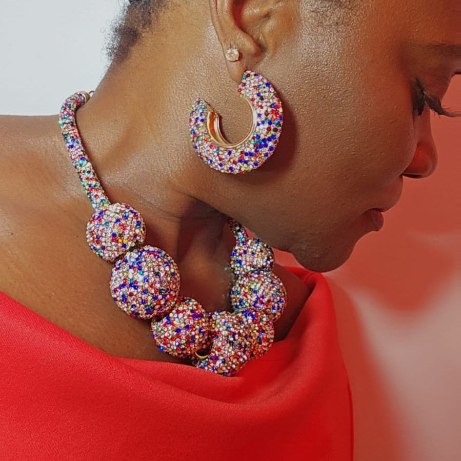 RHINESTONE BALL DESIGN EARRING SET.